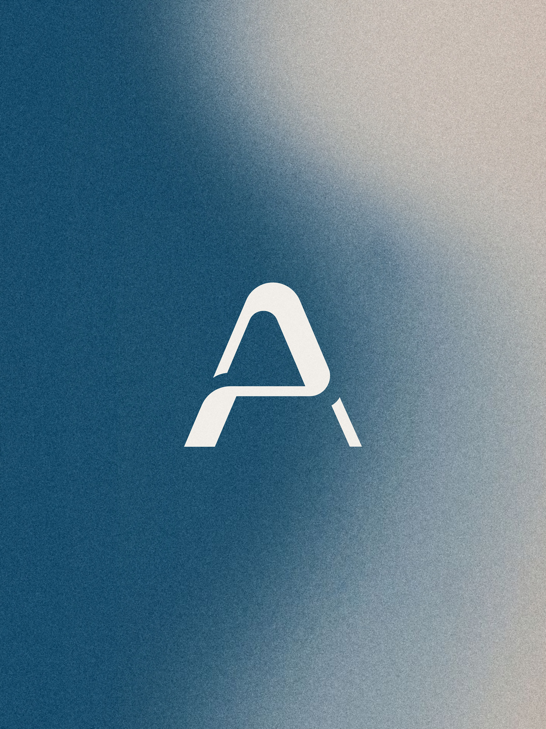The Aurevia A on a grainy ground of teal and sand.