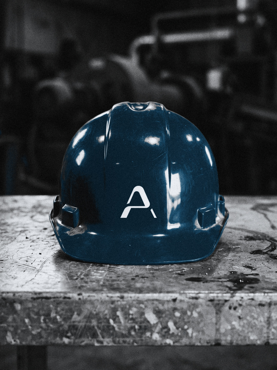 A navy hard hat with the Aurevia A.