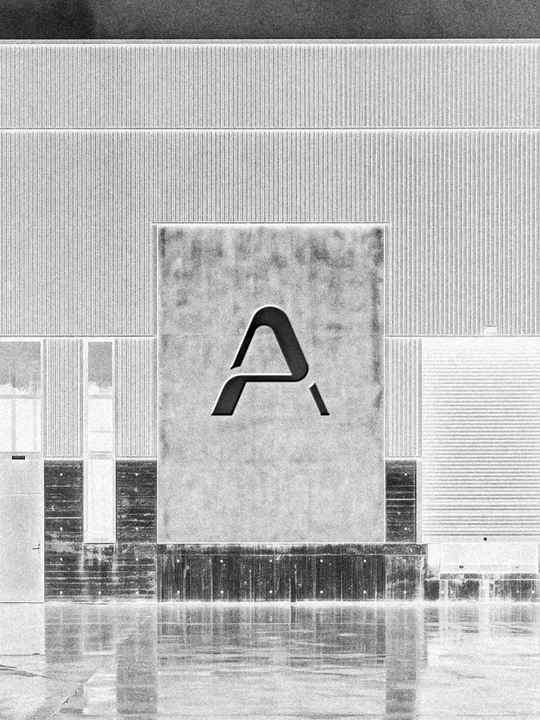 The Aurevia A on a building, in black and white.