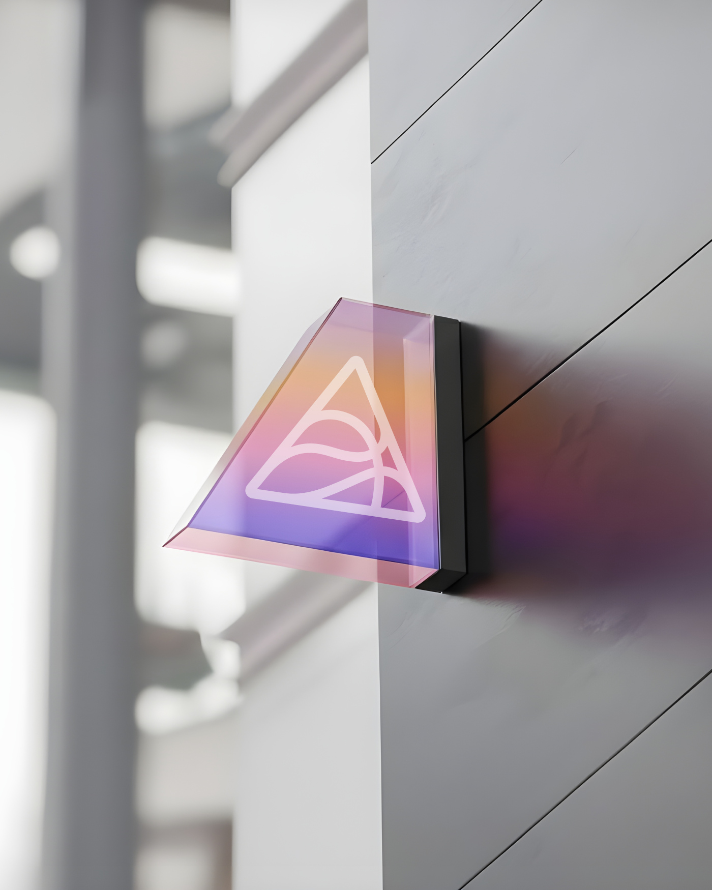 A prism sign on a concrete wall